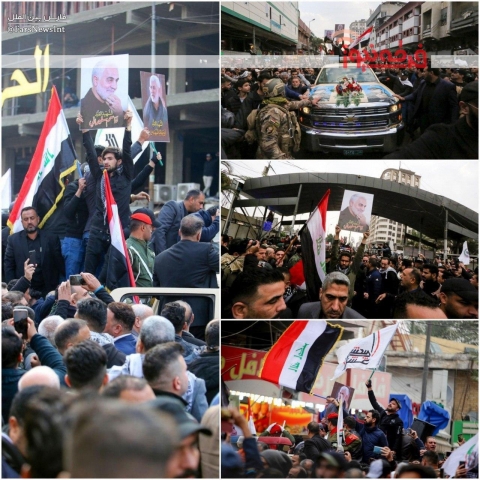 عکس سرداز شهید سلیمانی بر دستان جوانان عراقی در تشییع با شکوه بدنهای مطهر  حادثه تروریستی بغداد
